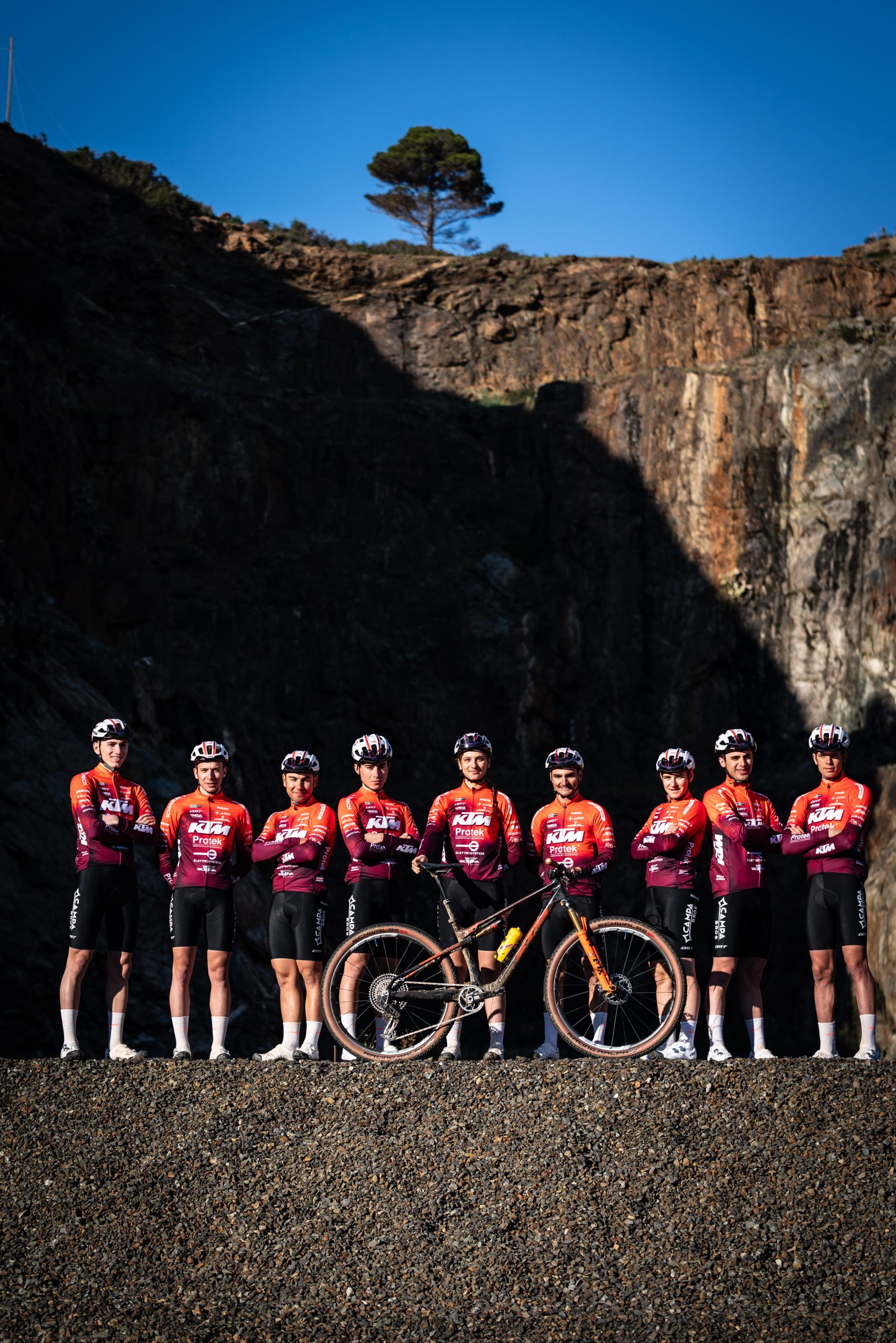 Group photo of the Protek KTM team at the Isle of Elba